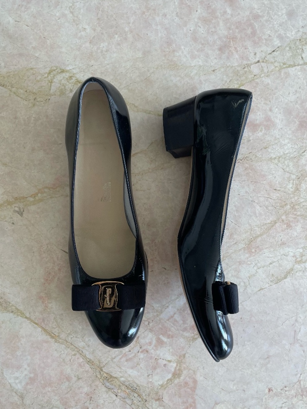 Salvador Ferragamo Black patent leather pumps with gold logo
